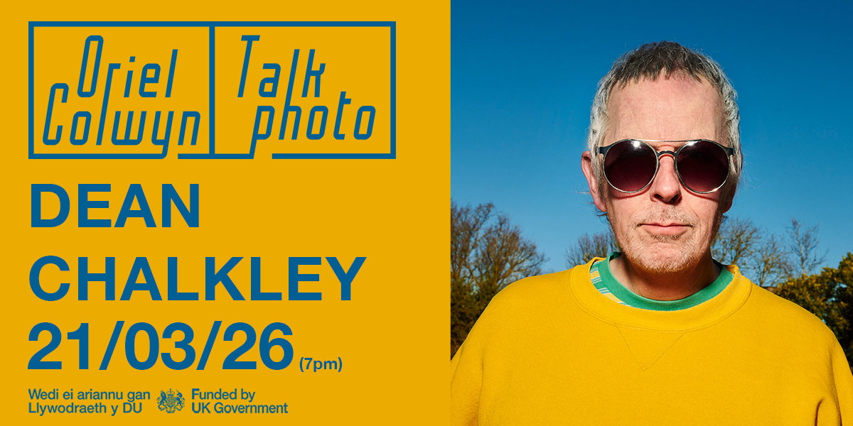 Event poster showing date and image of photographer.
