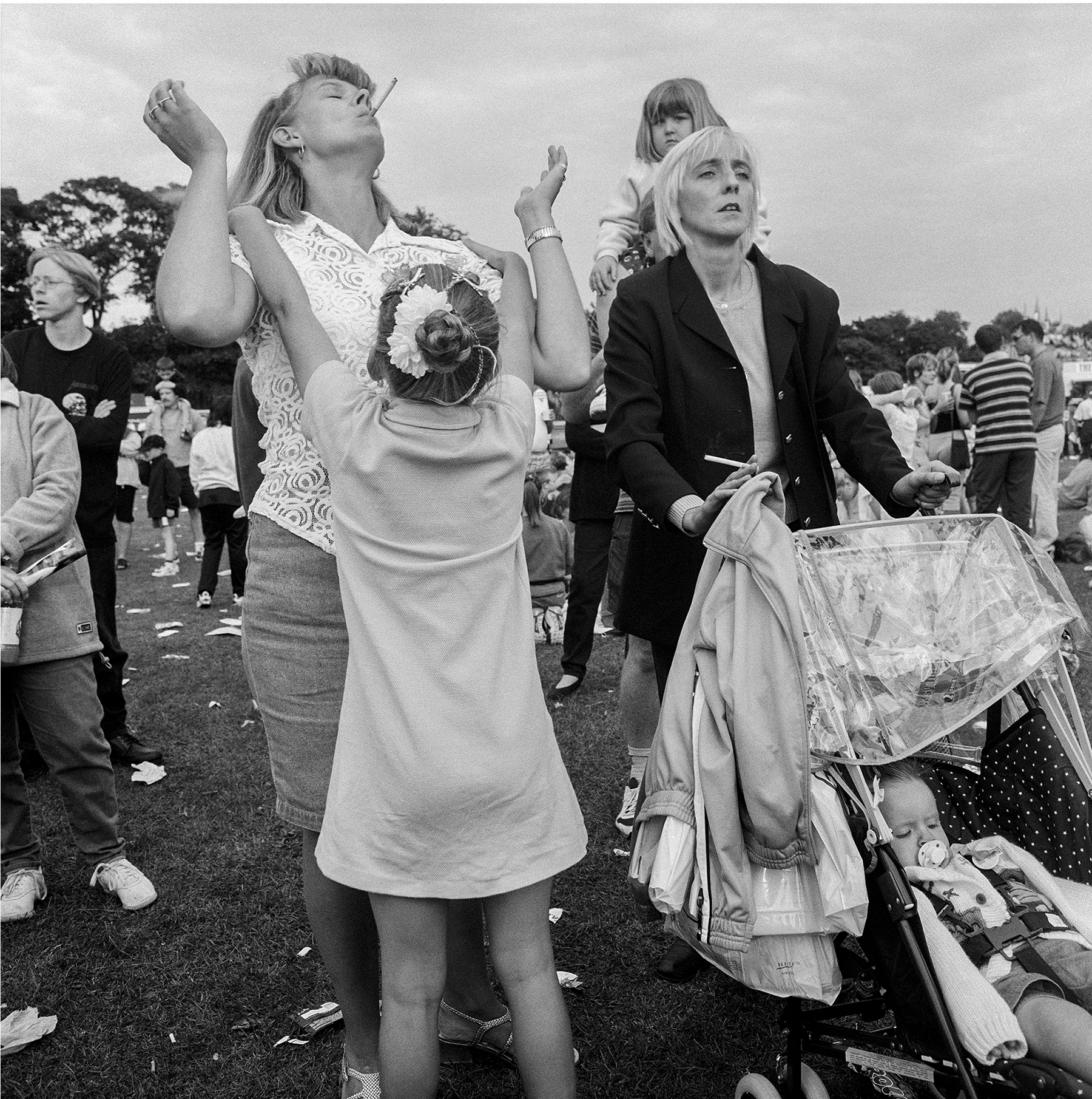 Artist photograph showing families at an event.